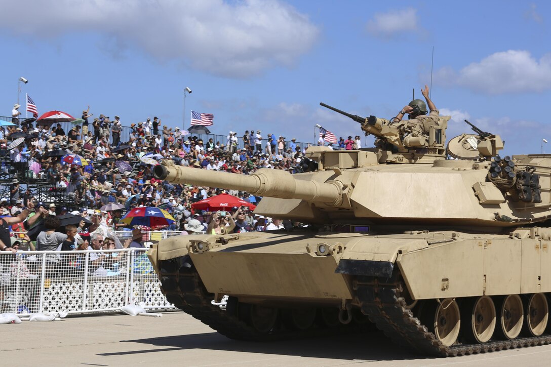 Marines conducted a Marine Air-Ground Task Force demonstration during the 2015 MCAS Miramar Air Show aboard Marine Corps Air Station Miramar, Calif., Oct. 2. This year's air show theme honored veterans and their families. (U.S. Marine Corps photo by Cpl. Alissa P. Schuning/Released)