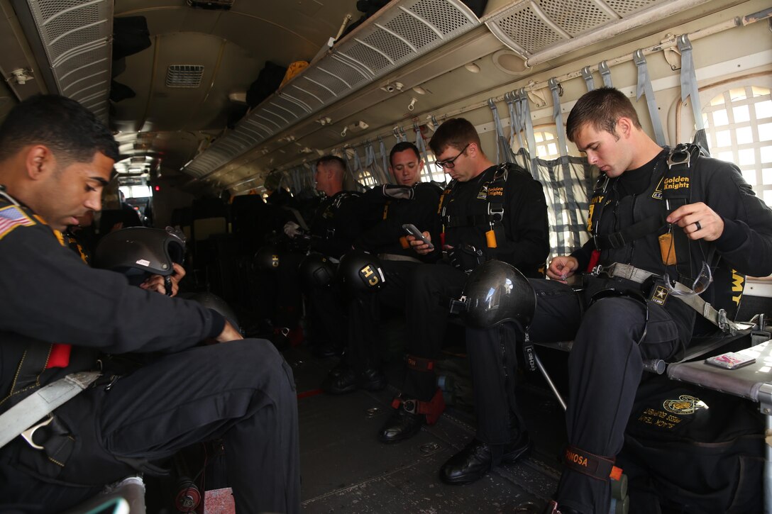 The Army’s Golden Knights parachute team prepares for a jump during the 2015 MCAS Miramar Air Show aboard Marine Corps Air Station Miramar, Calif., Oct. 3. The two-person teams consist of active duty men and women from all military occupational specialties. (U.S. Marine Corps photo by Cpl. Alissa P. Schuning/Released)