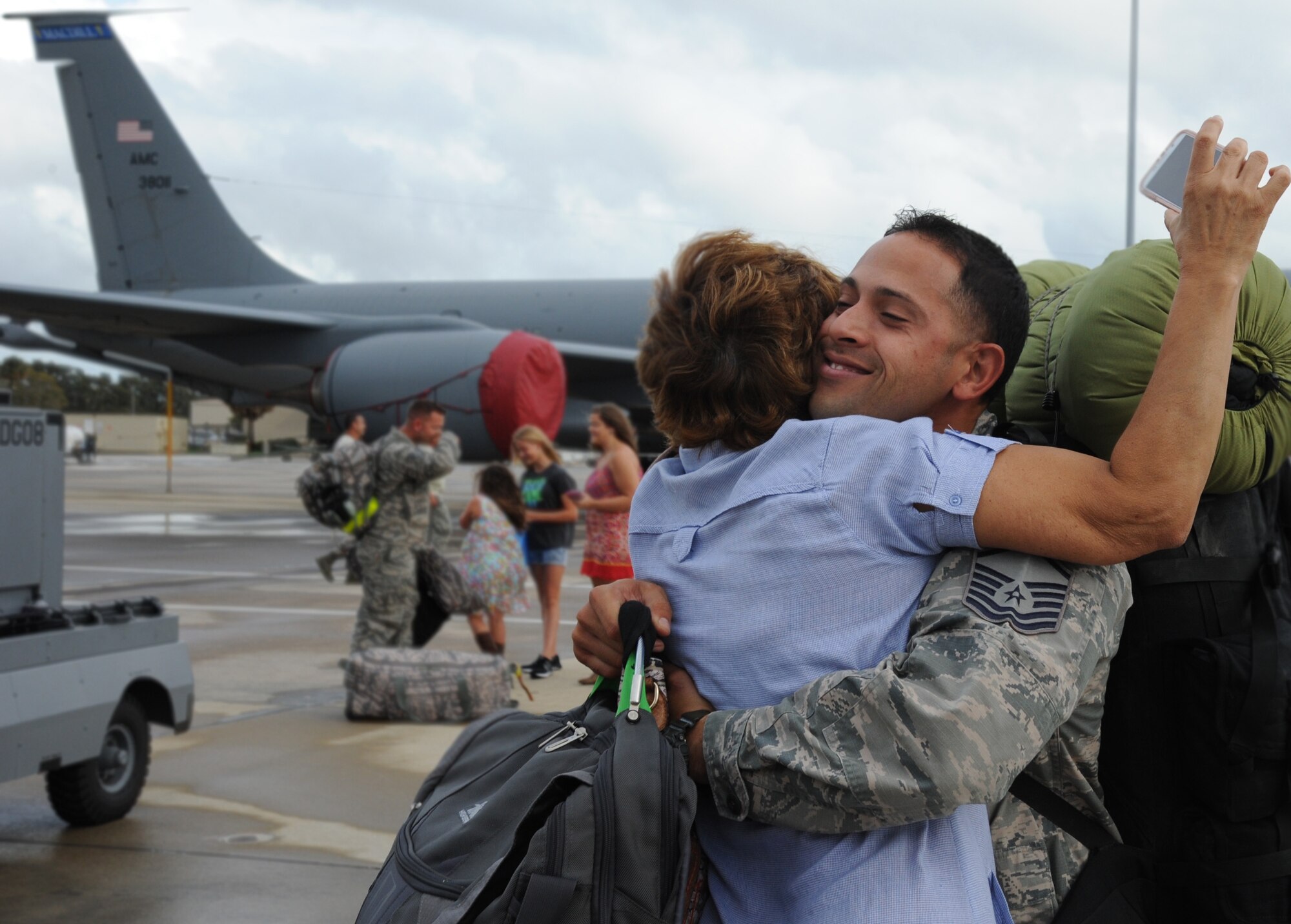 Family and friends gathered on the MacDill Air Force Base flight line to welcome home the latest group of 927th Air Refueling Wing Airmen who returned from a months-long deployment OCt. 4, 2015.The reservists deployed to an undisclosed location and included both KC-135 Stratotanker aircrew and an element of aircraft maintainers. (U.S. Air Force Photo/Tech. Sgt. Peter Dean)