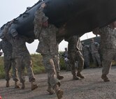 U.S. Army Reserve combat engineers with the 455th Engineer Company out of Hayden Lake, Idaho, compete in Sapper Stakes 2015 in a timed Zodiac boat carry at Fort Chaffee, Ark., Aug. 31. (U.S. Army photo by Staff Sgt. Debralee Best)