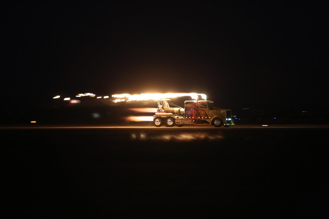 The jet-propelled Shockwave Jet Truck races down the flight line during the 2015 MCAS Miramar Air Show aboard Marine Corps Air Station Miramar, Calif., Oct. 3. The theme of this year’s air show is “A Salute to Veterans and their Families.” (U.S. Marine Corps photo by Sgt. Melissa Wenger/Released)