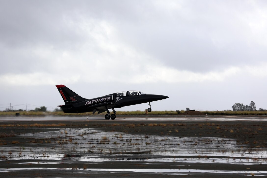 A member of the Patriots L-39 Jet Team lands on the flight line during the team’s performance at the 2015 MCAS Miramar Air Show aboard Marine Corps Air Station Miramar, Calif., Oct. 4. The Patriots Jet Team consists of former U. S. Navy Blue Angels, Air Force Thunderbirds and Canadian Snowbirds pilots. (U.S. Marine Corps photo by Sgt. Melissa Wenger/Released)
