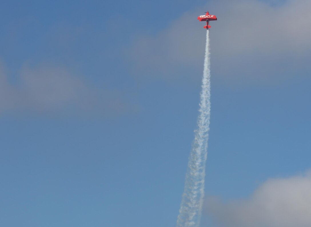 Sean Tucker, Oracle Challenger pilot, flies as high as he can to perform aerial stunts during the 2015 Miramar Air Show aboard Marine Corps Air Station Miramar, Calif., Oct. 3. Tucker modified his plane to be able to perform his unique stunts during these shows. (U.S. Marine Corps Photo by Lance Cpl. Kimberlyn Adams/Released)