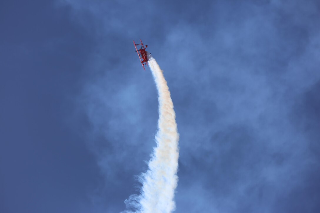 The Oracle Challenger performs a one-of-a-kind aerobatic flight during the 2015 MCAS Miramar Air Show aboard Marine Corps Air Station Miramar, Calif., Oct. 3. Sean Tucker, the pilot of the Oracle, has flown in more than 1,000 performances around the country. (U.S. Marine Corps Photo by Lance Cpl. Kimberlyn Adams/Released)