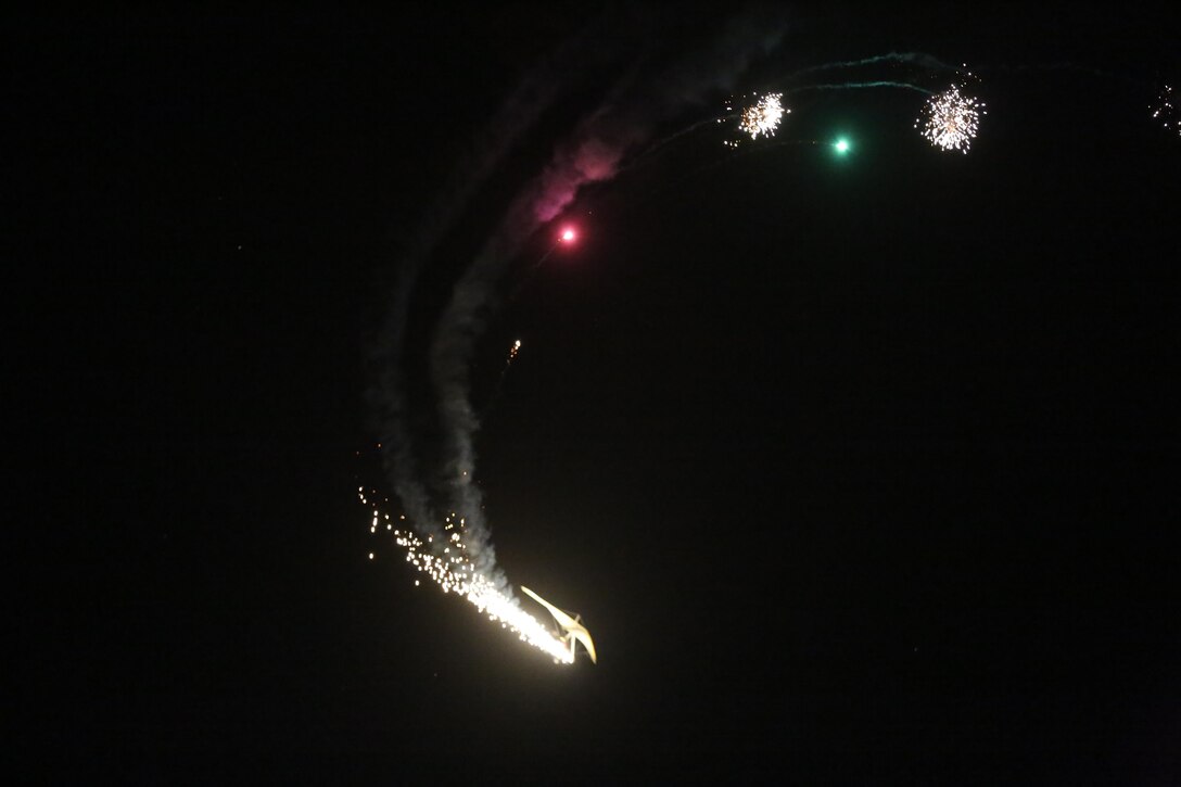 Dan Buchanan pilots an illuminated hang glider during his performance at the 2015 MCAS Miramar Air Show aboard Marine Corps Air Station Miramar, Calif., Oct. 3. Buchanan has accrued more than 2,400 hours of flight time in hang gliders. (U.S. Marine Corps photo by Lance Cpl. Kimberlyn Adams/Released)