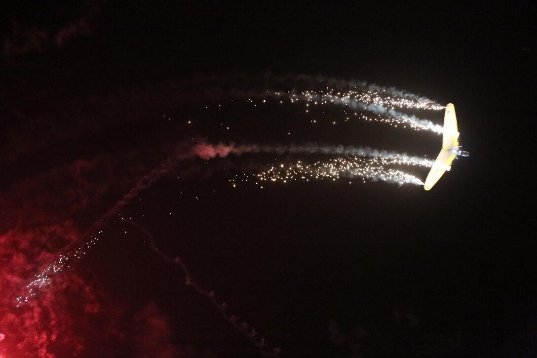 Dan Buchanan pilots an illuminated hang glider during his performance at the 2015 MCAS Miramar Air Show aboard Marine Corps Air Station Miramar, Calif.,  Oct. 3. Buchanan has accrued more than 2,400 hours of flight time in hang gliders. (U.S. Marine Corps photo by Lance Cpl. Kimberlyn Adams/Released)