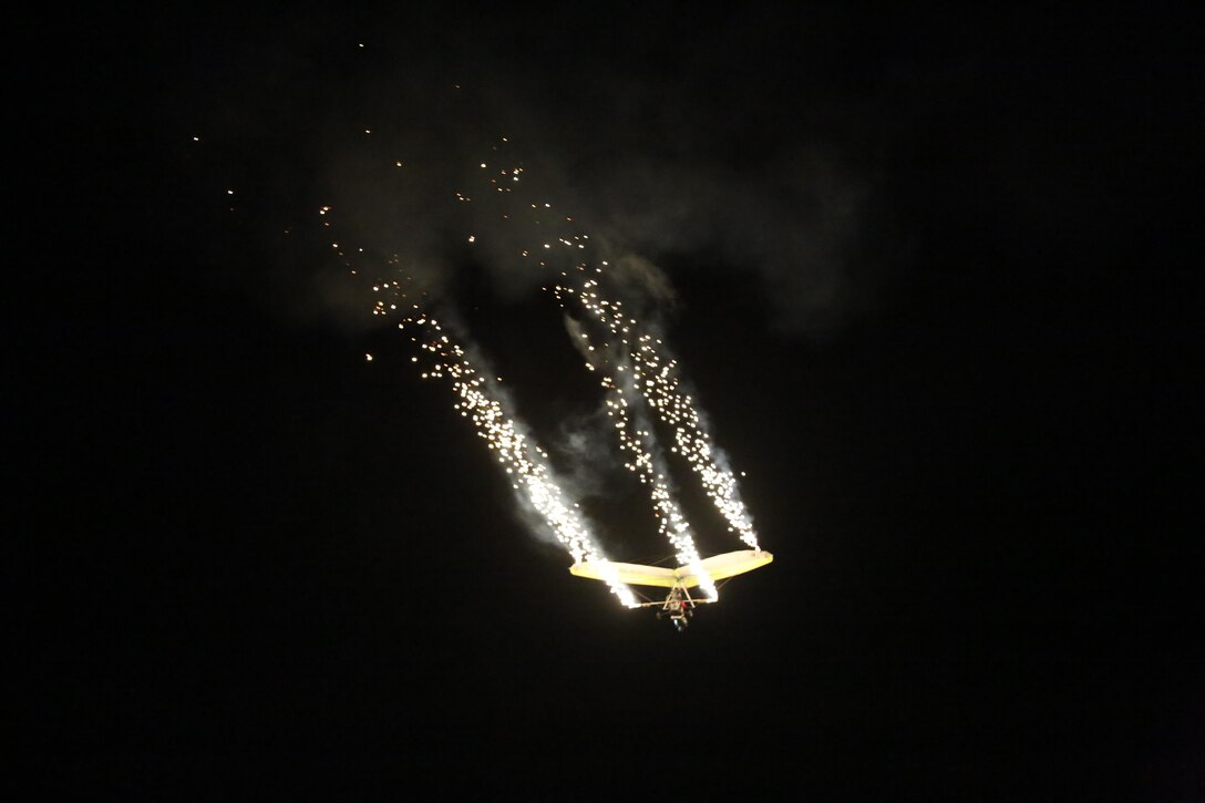 Dan Buchanan pilots an illuminated hang glider during his performance at the 2015 MCAS Miramar Air Show aboard Marine Corps Air Station Miramar, Calif.,  Oct. 3. Buchanan has accrued more than 2,400 hours of flight time in hang gliders. (U.S. Marine Corps photo by Lance Cpl. Kimberlyn Adams/Released)