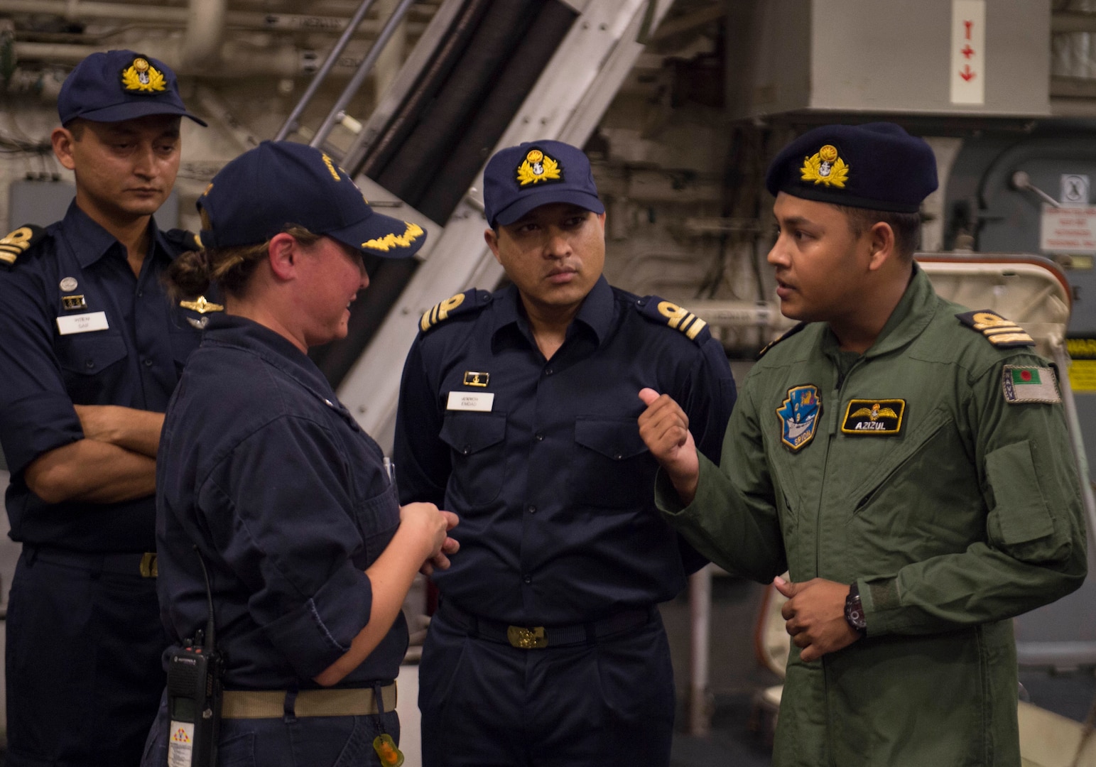 150930-N-MK881-404
BAY OF BENGAL (September 30, 2015) Cmdr. Michel Falzone, executive officer of the littoral combat ship USS Fort Worth (LCS 3), leads Bangladesh Navy Sailors on a tour of Fort Worth as part of Cooperation Afloat Readiness and Training (CARAT) Bangladesh 2015. CARAT is an annual, bilateral exercise series with the U.S. Navy, U.S. Marine Corps and the armed forces of nine partner nations. (U.S. Navy photo by Mass Communication Specialist 2nd Class Joe Bishop/Released)