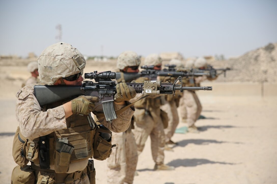 Security Force Marines with 3rd Battalion, 7th Marine Regiment, Special Purpose Marine Air-Ground Task Force -- Crisis Response -- Central Command, conduct a live-fire table five range in Southwest Asia, Sept. 29, 2015. The range tested the Marines ability to move, shoot and communicate ensuring the units mission readiness. The SPMAGTF-CR-CC provides the Commander, U.S. Central Command with a wide array of crisis response and contingency options across the 20 countries in the Area of Operations.