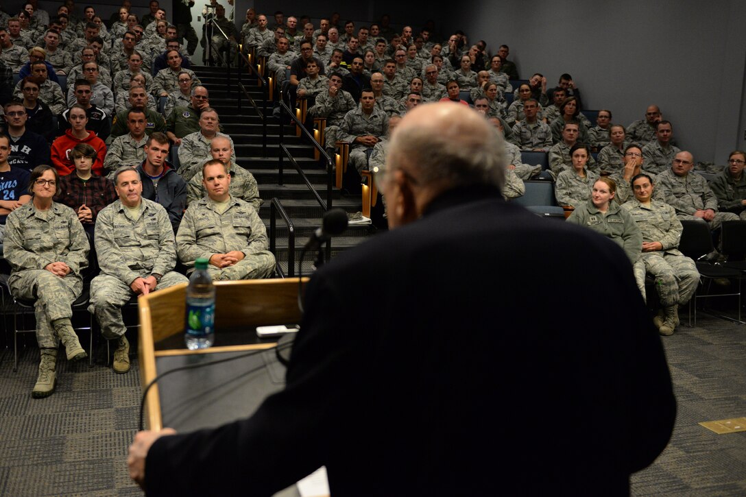 Members of the 157th Air Refueling Wing listen as former U.S. Army Air Corps Tech. Sgt. Herman ‘Herk’ Streitburger speaks during his presentation, Pease Air National Guard Base, New Hampshire, Oct. 3, 2015.  During his presentation, Streitburger discussed being shot down, surviving a prisoner of war camp and his eventual escape. (U.S. Air National Guard photo by Staff Sgt. Curtis J. Lenz) 