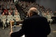 Members of the 157th Air Refueling Wing listen as former U.S. Army Air Corps Tech. Sgt. Herman ‘Herk’ Streitburger speaks during his presentation, Pease Air National Guard Base, New Hampshire, Oct. 3, 2015.  During his presentation, Streitburger discussed being shot down, surviving a prisoner of war camp and his eventual escape. (U.S. Air National Guard photo by Staff Sgt. Curtis J. Lenz) 