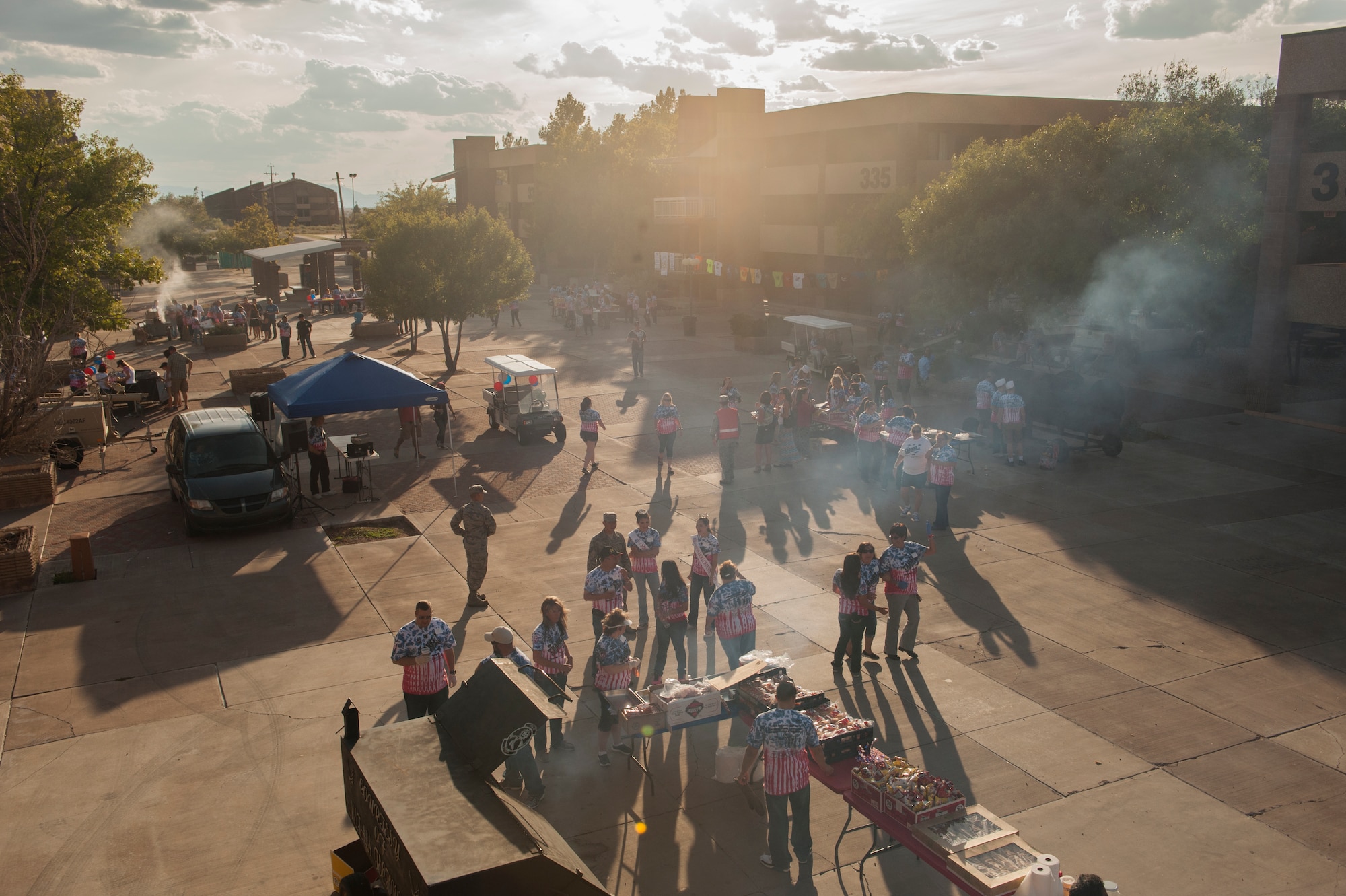Holloman Airmen and members from the community gather for the annual Thanks Team Holloman event between the dorms at Holloman Air Force Base, Oct. 2. Community members host this event every year to show their appreciation for Holloman AFB members. (U.S. Air Force photo by Airman 1st Class Randahl J. Jenson)   