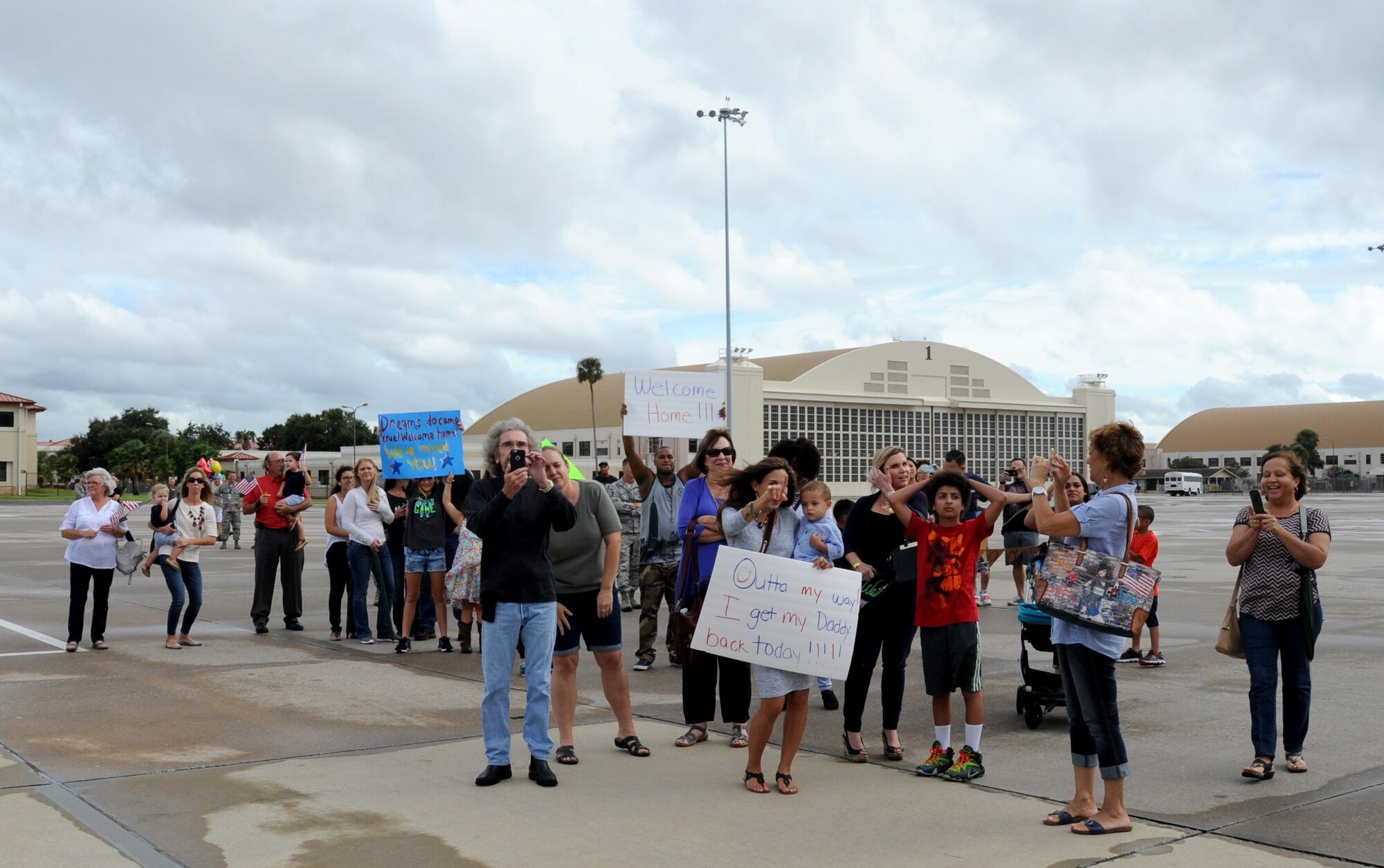 At the close of the October Unit Training Assembly, family and friends gathered to welcome home the latest group of 927 ARW redeployers. The reservists deployed to an undisclosed location and included both KC-135 Stratotanker aircrew and an element of aircraft maintainers. (U.S. Air Force Photo/Tech. Sgt. Peter Dean)