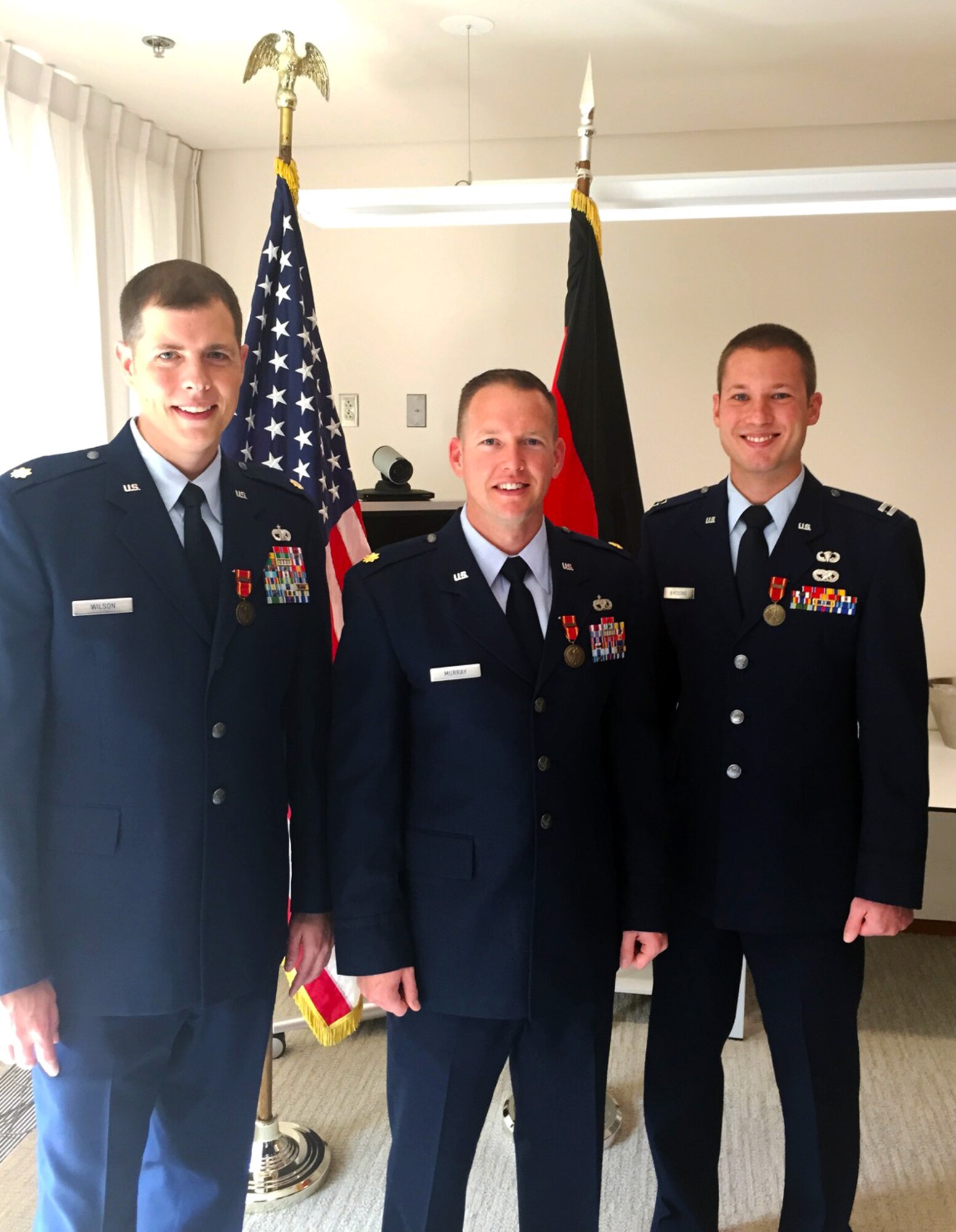 Maj. Ryan Murray, 341st Logistics Readiness Squadron commander at Malmstrom Air Force Base, Mont., was awarded the Bronze Foreign Duty Medal of the Federal Armed Forces on behalf of the Federal Republic of Germany Jan. 6, 2015. Murray, center, received the medal along with his team members, Maj. Joseph Wilson, left and Capt. Eric Birdsong, right, for work in a joint coalition task force in Kabul advising national level logistics for the Afghanistan Army and Police. (Courtesy photo)