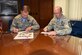 Col. Mark Slocum, 4th Fighter Wing commander, and Chief Master Sgt. Jeffrey Craver, 4 FW command chief, sign their pledge forms to kick off the annual Combined Federal Campaign on Oct. 2, 2015, at Seymour Johnson Air Force Base, North Carolina. The CFC provides members of Team Seymour the opportunity to donate to more than 20,000 charities. (U.S. Air Force photo/Senior Airman Aaron J. Jenne)