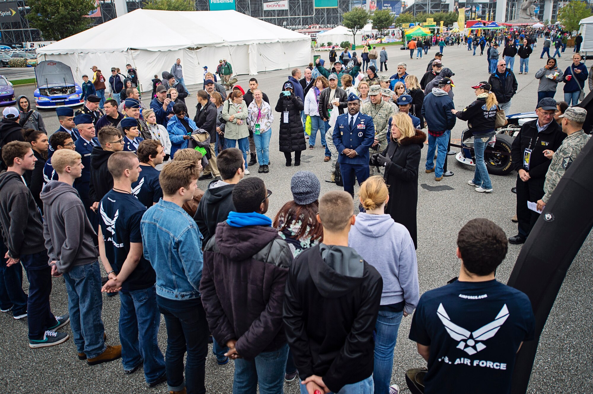 Secretary of the Air Force Deborah Lee James speaks to Air Force recruits, thanking them for joining the military inside the Military Village Expo at the AAA 400 NASCAR race at the Dover International Speedway, Dover, Del., Oct. 4. James was an honored guest at the track and administered the oath of enlistment to over 22 recruits entering the Armed Services, along with meeting members of ‪Team Dover‬. (U.S. Air Force photo/Capt. Bernie Kale)