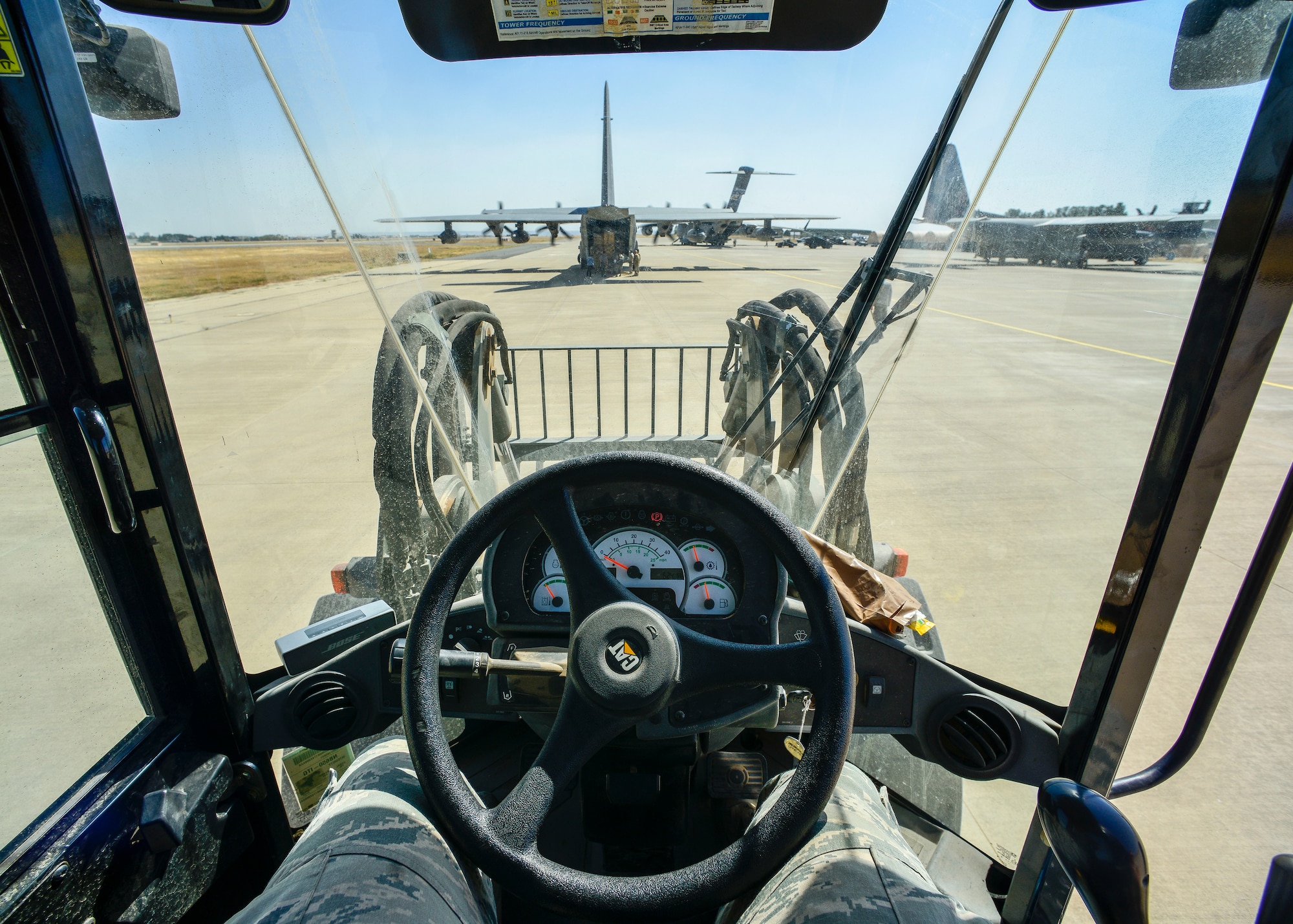 Airman 1st Class Christopher McDade, 435th Contingency Response Squadron air transportation journeyman, stands by to unload cargo off an HC-130J Combat King II, Sept. 28, 2015, at Diyarbakir Air Base, Turkey. Airmen from the 435th Contingency Response Group received more than 680 tons of equipment for base operations in support of U.S. Air Forces Central Command personnel recovery mission for Operation Inherent Resolve. (U.S. Air Force photo by Airman 1st Class Cory W. Bush/Released)