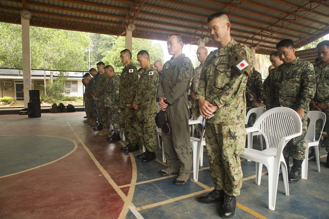 Armed Forces of the Philippines, Japanese Ground Self-Defense Force, U.S. Marines and U.S. Navy service members come together for the Command Post Exercise opening ceremony, Oct. 1, at Naval Forces Northwest during Amphibious Landing Exercise 2015. PHIBLEX 15 is an annual, bilateral training exercise conducted by members of the Armed Forces of the Philippines alongside U.S. Marine and Navy Forces. It focuses on strengthening the partnership and relationships between the two nations across a range of military operations, including disaster relief and complex expeditionary operations.
