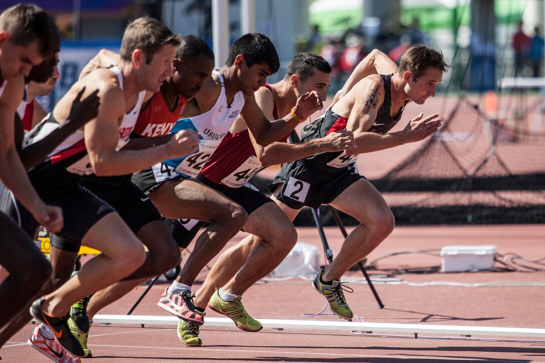 U.S. track athlete Daniel Castle, right, competes in the men's 1,500-meter competition during the 6th Conseil International du Sport Militaire’s (CISM) Military World Games in Mungyeong, South Korea, Oct. 6, 2015. The CISM World Games provide the opportunity for the athletes from more than 100 nations to come together and enjoy friendship through sports. U.S. Marine Corps photo by Cpl. Jordan E. Gilbert