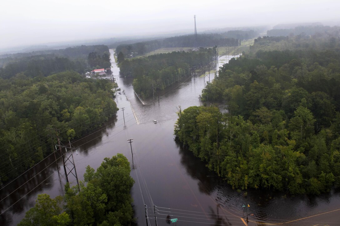 An aerial view taken from a Coast Guard helicopter showing the continuing effects of flooding caused by Hurricane Joaquin in areas surrounding Charleston, S.C., Oct. 5, 2015. U.S. Coast Guard photo by Petty Officer 1st Class Stephen Lehmann