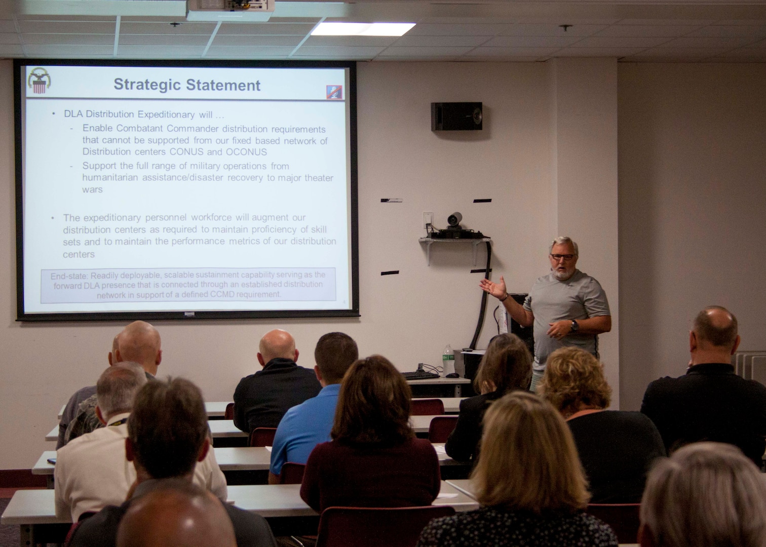 Paul Plevich, chief of DLA Distribution Susquehanna, Pa’s., Expeditionary Team, talks to the Defense Distribution Center, Susquehanna Emergency Management Workgroup about his team’s capabilities. 