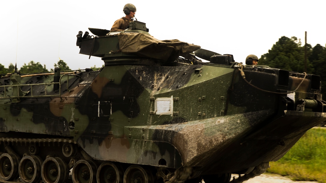 Marines with 2nd Assault Amphibian Battalion conducted a Heavy Brigade Combat Team qualification course at Camp Lejeune, N.C., Oct. 1, 2015. The training focused on engaging targets with the Amphibious Assault Vehicle P7, a fully-tracked amphibious vehicle used to transport troops from water to land during amphibious operations. (U.S. Marine Corps photo by Cpl. Krista James/Released)