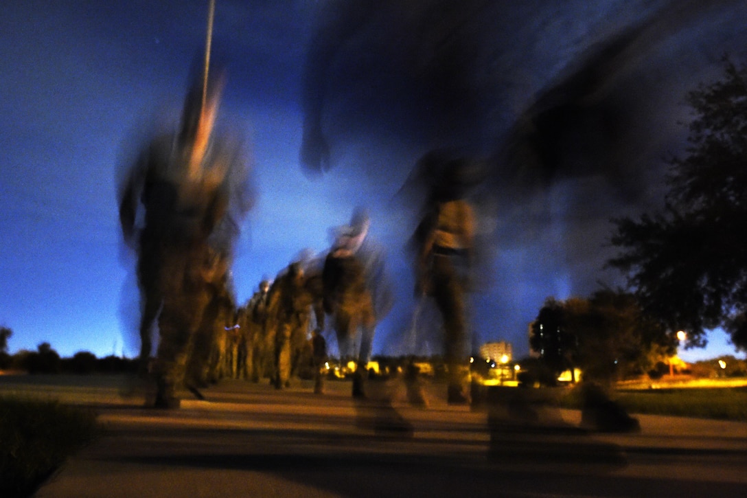 Participants in the 2015 Special Tactics Memorial Ruck March start start the event on Joint Base San Antonio, Oct. 4, 2015. The march covers over 812 miles, ending at Hurlburt Field, Fla., in memory of comrades who have fallen since Sept. 11, 2001. Each Airman participating carries a 50-pound ruck sack to bring awareness to the service and sacrifice of Special Tactics members. U.S. Air Force photo by Senior Airman Keith James