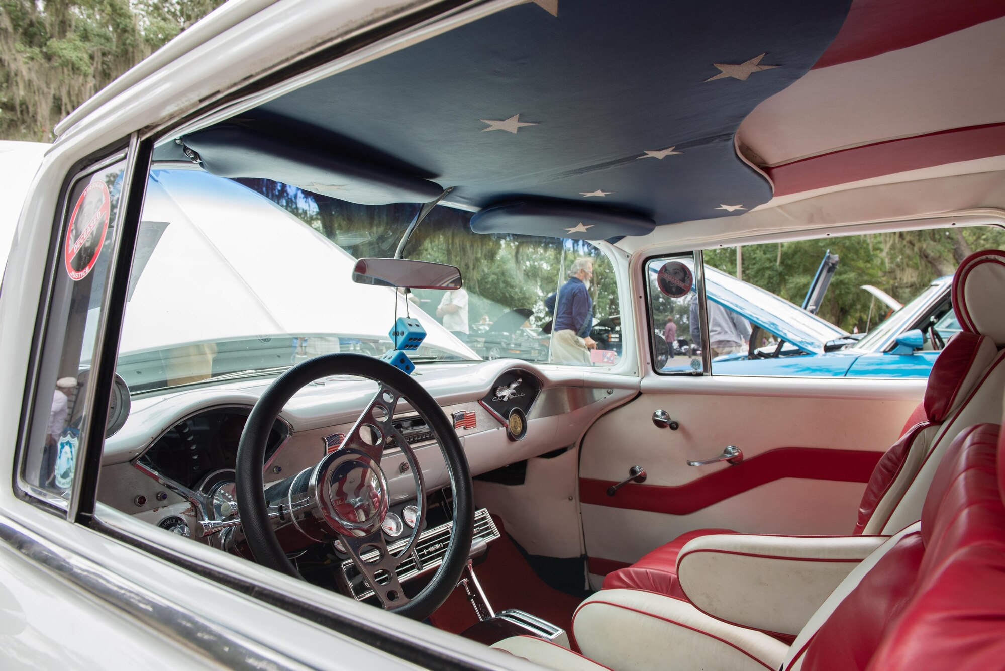 A 1955 Chevrolet C10 street rod with 9/11 remembrance interior sits on display at the marina park during the Cruisin’ Keesler 12th Annual Car Show Oct. 3, 2015, Keesler Air Force Base, Miss. There were over 115 classic car, truck, bike, and hot rod entries and over 40 awards presented. (U.S. Air Force photo by Marie Floyd)