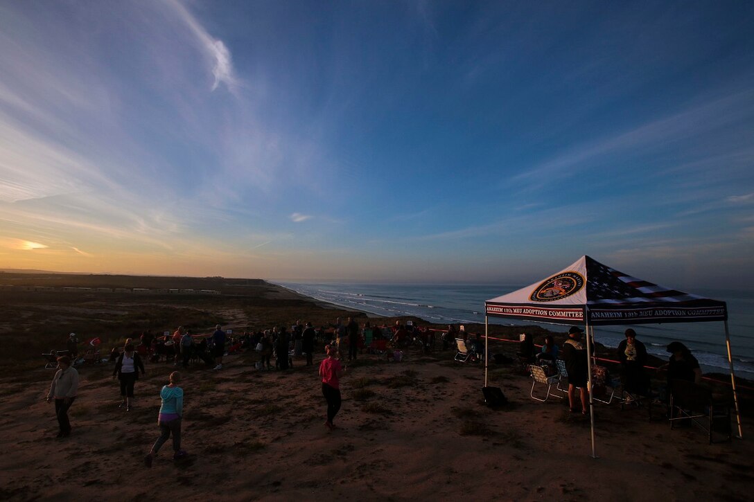 Family and friends of Marines and Sailors with the 13th Marine Expeditionary Unit, I Marine Expeditionary Force, rose with the sun to observe amphibious operations aboard Marine Corps Base Camp Pendleton, Calif., Sept. 28, 2015. The expo gave families an opportunity to observe their loved ones at work as well as a chance to build connections that will help them through the 13th MEU’s upcoming deployment. (U.S. Marine Corps photo by Lance Cpl. Caitlin Bevel)