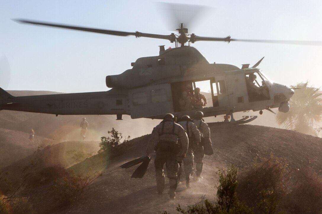 U.S. Marines conduct a helocast exercise out of a UH-1Y Venom at Ferguson Lake near Yuma, Ariz., Oct. 3, 2015. The exercise is part of  a seven-week weapons and tactics event to provide standardized tactical training and certify instructors to support readiness. U.S. Marine Corps photograph by Staff Sgt. Artur Shvartsberg
