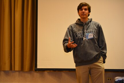 Zachary Forrest, son of Col. Sandra Forrest, logistics director 80th Training Command (TASS), participates in a public speaking exercise during a joint teen council meeting with members of the 412th Theater Engineer Command and the 75th Training Command teen councils in Alexandria, Va., July 28, 2015. The meeting afforded the 80th TC teens an opportunity to share their ideas, challenges and best practices with members of the 75th TC and the 412th TEC councils.