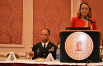 Hon. Tiffany Johnson-Cole, Tuskegee, Ala., municipal court judge, introduces Maj. Gen. A. C. Roper, commander 80th Training Command, during the Tuskegee University: Centennial Awards Leadership Banquet where Roper delivered the keynote address, Tuskegee, Ala., Sept. 24, 2015. The banquet marked the culmination of the 20th Annual Booker T. Washington Economic Development Summit.