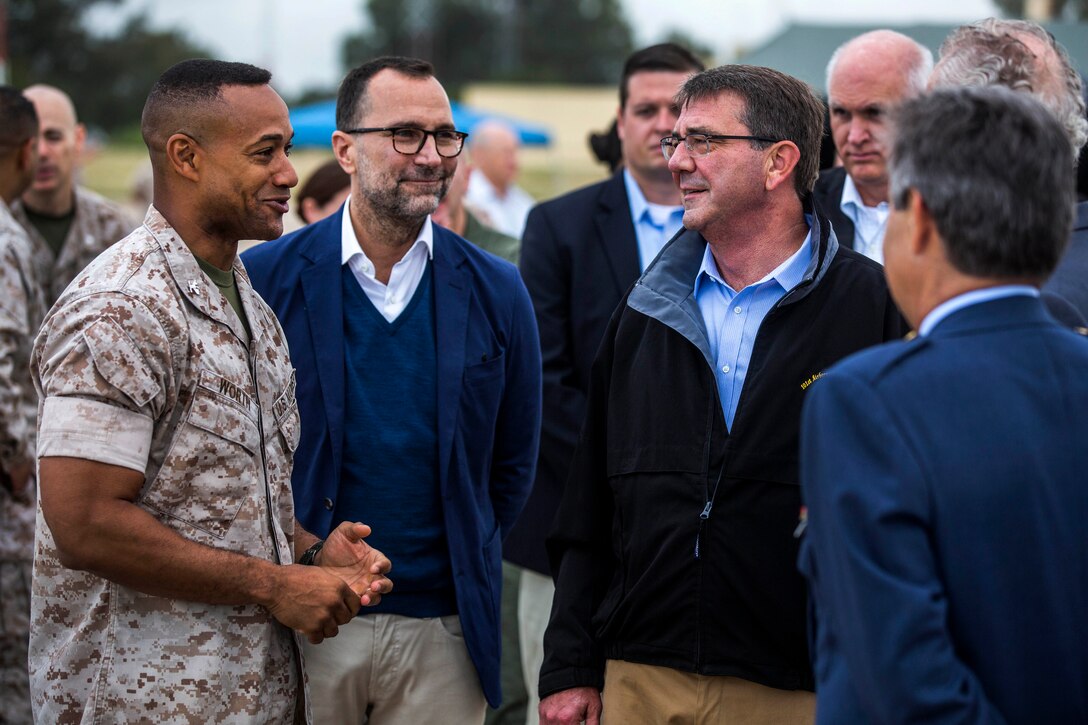U.S. Defense Secretary Ash Carter, right center, talks with U.S. Marine Corps Col. Calvert Worth, left, and U.S. Ambassador to Spain James Costos while visiting Morón Air Base, Spain, Oct. 6, 2015. Worth is commander of Special-Purpose Marine Air-Ground Task Force Crisis Response-Africa. U.S. Marine Corps photo by Staff Sgt. Vitaliy Rusavskiy