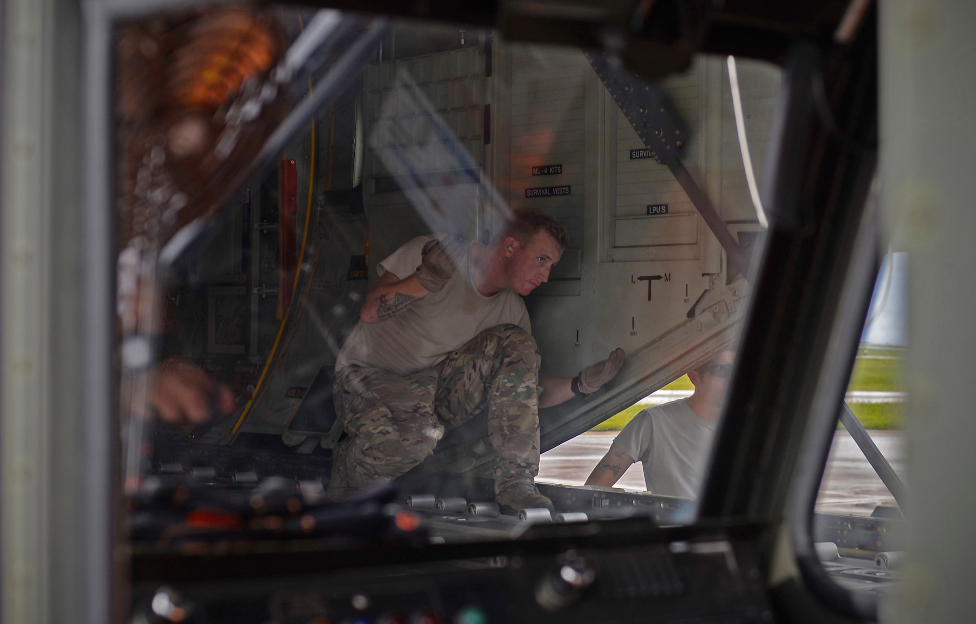 A 17th Special Operations Squadron MC-130J Commando II loadmaster, guides the driver of a load carrier toward a MC-130J Commando II during an exercise Sept. 18, 2015, at Andersen Air Force Base, Guam. The MC-130H was part of a dissimilar formation with an MC-130J that completed a Maritime Craft Aerial Delivery System airdrop.  This was the first time an MC-130J Commando II completed the MCADS airdrop in the Pacific. (U.S. Air Force photo by Staff Sgt. Alexander Riedel)