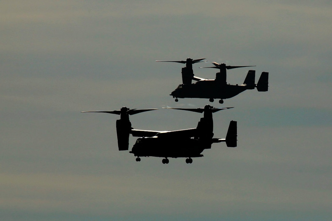 Marines with the 13th Marine Expeditionary Unit, I Marine Expeditionary Force, fly MV-22 Ospreys for an aerial demonstration during a family expo at Marine Corps Base Camp Pendleton, Calif., Sept. 28, 2015. The expo gave families an opportunity to observe their loved ones at work as well as a chance to build connections that will help them through the 13th MEU’s upcoming deployment.