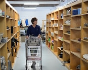 Tech. Sgt. Cindy Gray, Wyoming Military Department human resources specialist, moves through an isle in the Airmen’s Attic during the facility’s grand re-opening on F.E. Warren Air Force Base, Wyo., Oct. 3, 2015. Many old items were removed from the attic before the re-opening, giving visitors plenty of fresh items to look through. (U.S. Air Force photo by Airman 1st Class Malcolm Mayfield)