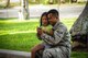 An Airman with the Hawaii Air National Guard's 154th Aircraft Maintenance Squadron shares a laugh with his daughter before leaving for a deployment, Sept. 26, 2015, Joint Base Pearl Harbor-Hickam. Airmen from the 154th Wing, Hawaii Air National Guard and active duty 15th Wing are part of the Hawaiian Raptor deployment to the Central Command Area of Responsibility. (U.S. Air National Guard photo by Airman 1st Class Robert Cabuco/released)
