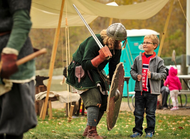 A Viking reenactor chooses a young boy to be his Jarl during Norsk Høstfest Military Appreciation Day in Minot N.D., Oct. 3, 2015. The Viking fought against other reenactors in his Jarl’s name, mimicking the Viking customs of old. (U.S. Air Force photo/Senior Airman Stephanie Morris)