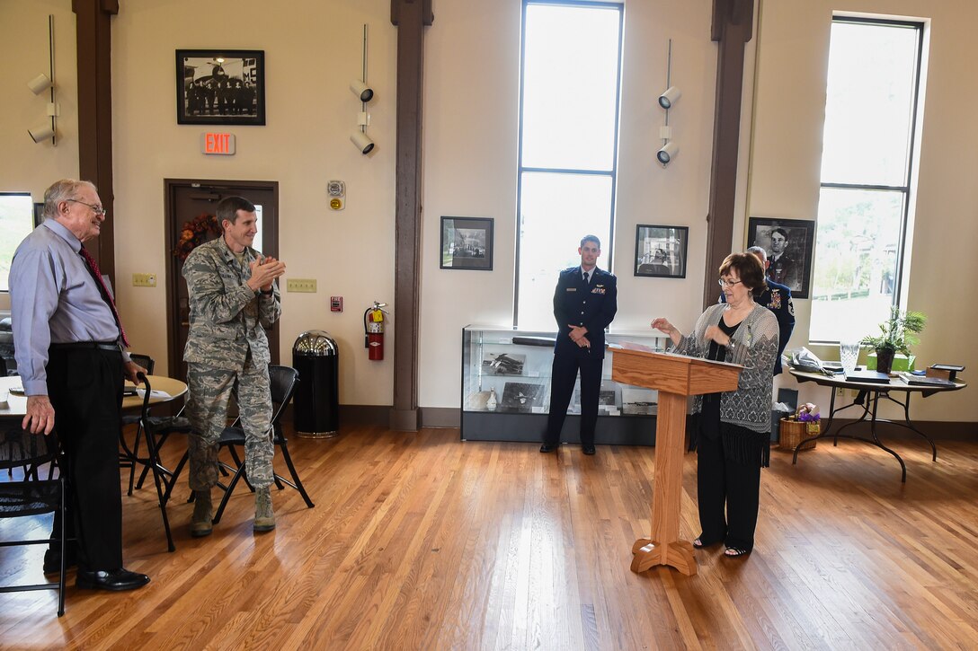 Ruth Treadwell, 347th Rescue Group secretary, addresses guests in attendance during her retirement ceremony Oct. 1, 2015, at Moody Air Force Base, Ga. Ruth began her administrative career in 1983 at Royal Air Force Mildenhall, England, and went on to work at the squadron, group and major command level. (U.S. Air Force photo by Senior Airman Ceaira Tinsley/Released)