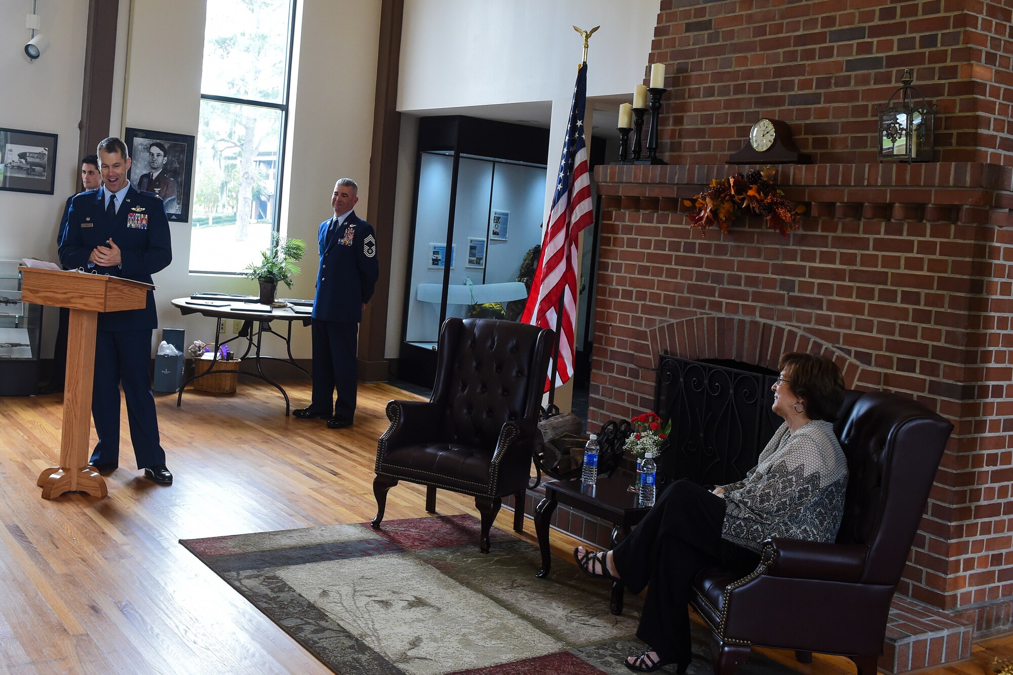U.S. Air Force Col. Thomas Dorl, 347th Rescue Group commander, shares his fondest memories of Ruth Treadwell, 347th RQG secretary, during her retirement ceremony Oct. 1, 2015, at Moody Air Force Base, Ga. Ruth worked as the 347th RQG secretary for 17 of her 32 years of civilian administrative service. (U.S. Air Force photo by Senior Airman Ceaira Tinsley/Released)