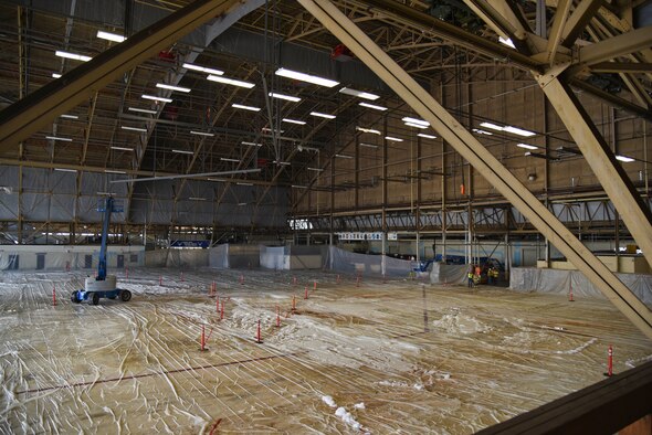 The 92nd Civil Engineer Squadron, maintainers, emergency responders and local contractors prepare for the foam suppression system test in hangar one Oct. 1, 2015, at Fairchild Air Force Base, Wash. The foam test was the last of a series of four, making sure the facilities, personnel and equipment are safe from potential hazards. (U.S. Air Force photo/Airman 1st Class Mackenzie Richardson)