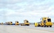 Snow removal equipment being operated by commanders from the base journey along the flight line during the annual Snow Parade Oct. 5, 2015, on Grand Forks Air Force Base, North Dakota. There were 12 pieces of snow removal equipment in the parade this year. (U.S. Air Force photo by Airman 1st Class Bonnie Grantham/released)