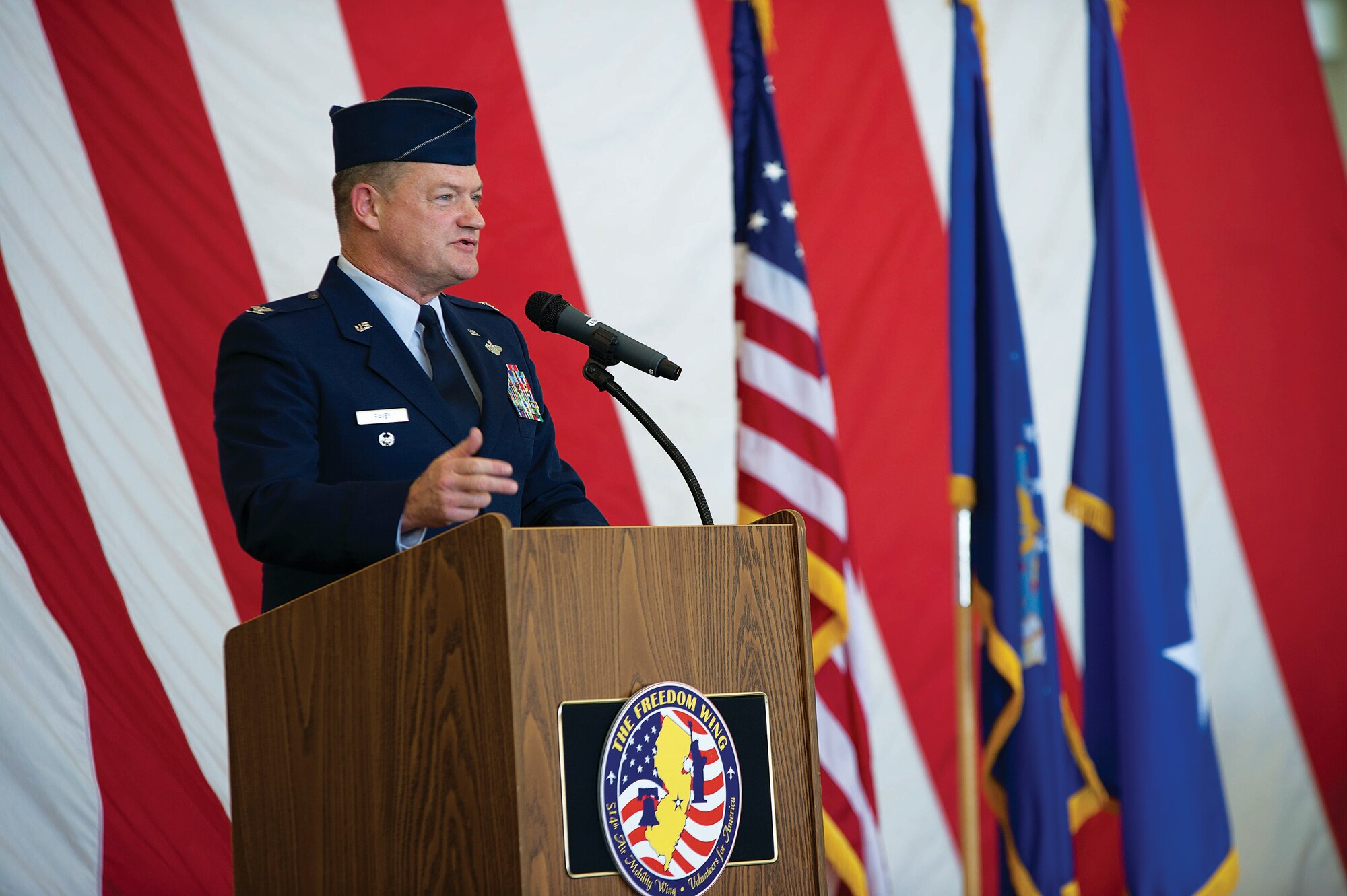 Col. David Pavey, 514th Air Mobility Wing commander, addresses the audience during a change-of-command ceremony Aug. 22. (U.S. Air Force photo by Christian De Luca)