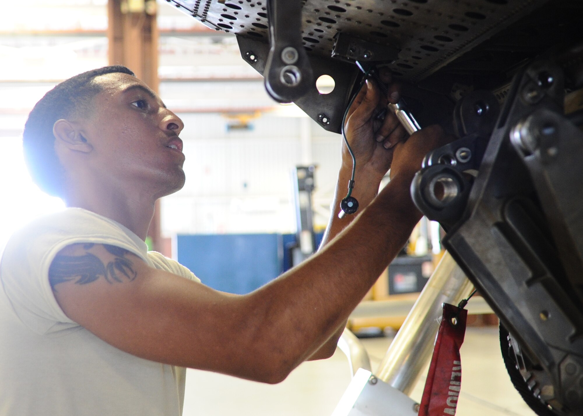 Airman 1st Class Gerardo Gomez, 325th Maintenance Squadron aerospace propulsion journeyman, repairs segments to an aircraft component Sept. 9 at the propulsion flight facility. The 325th MXS propulsion flight Airmen maintain and refurbish engines for F-22 Raptors. (U.S. Air Force photo by Senior Airman Ty-Rico Lea/Released)