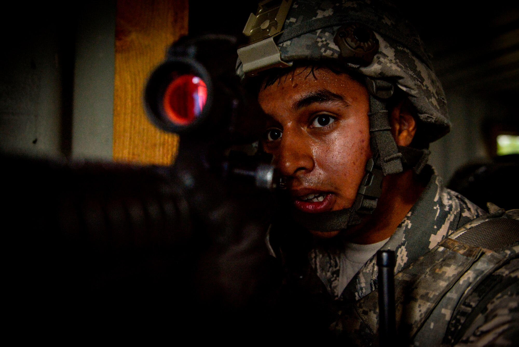 Senior Airman Juan Zamora, 86th Security Forces Squadron patrolman, clears a building during the Creek Defender field training exercise Sept. 26, 2015, on Baumholder, Germany.  After the classroom portion of the Creek Defender course, security forces members were placed in a training environment, where they were tested on dismounted and mounted patrols, land navigation, range estimation, weapons firing and tactical firing under stress. (U.S. Air Force photo/Senior Airman Nicole Sikorski)