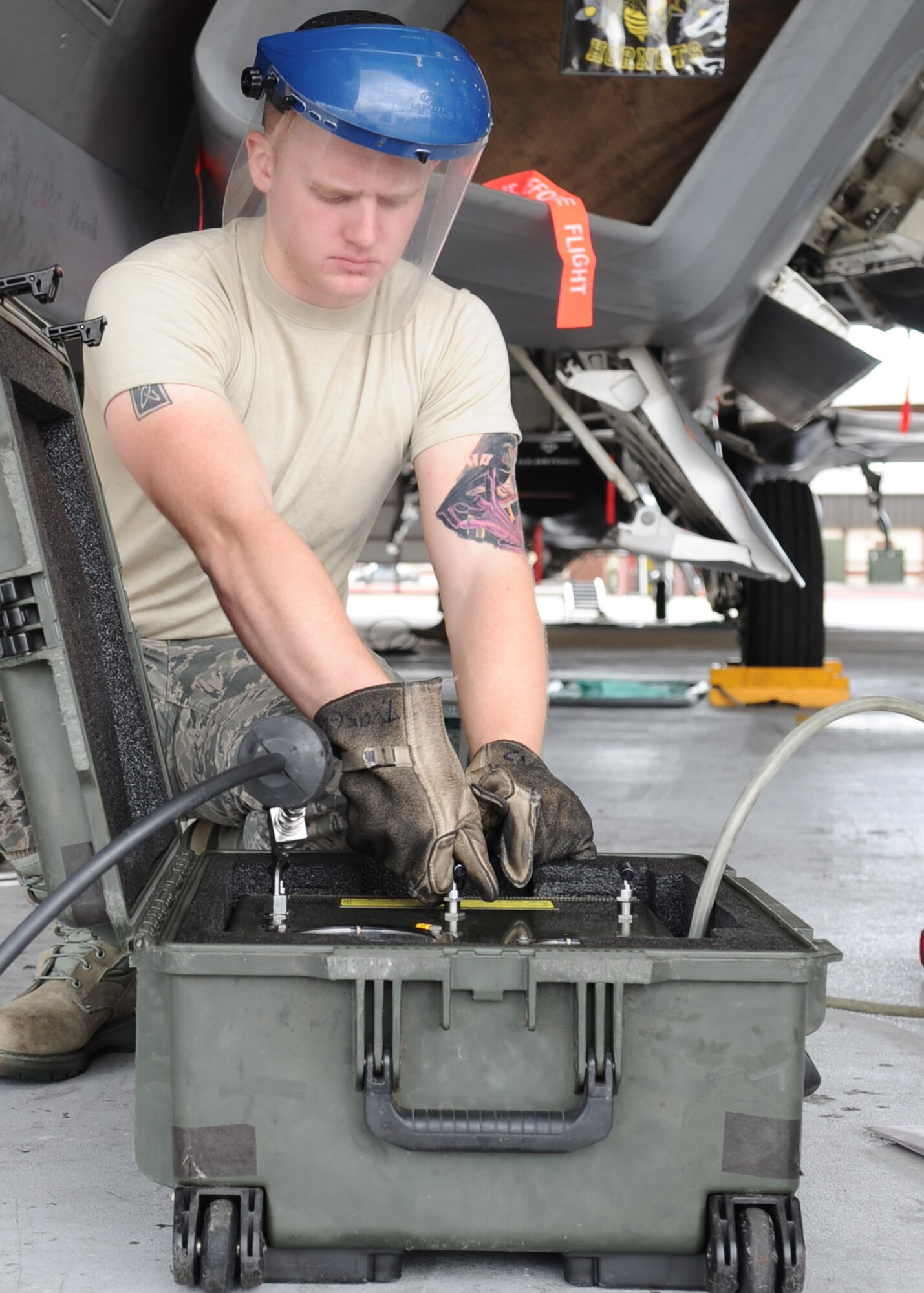Airman 1st Class Steven Shea, 325 Maintenance Squadron package maintenance plan member journeyman operates a stored energy system Sept. 10 at Hangar 3. The stored energy system is used to start auxiliary power units on aircraft and assist emergency landing gear operations. (U.S. Air Force photo by Senior Airman Ty-Rico Lea/Released)