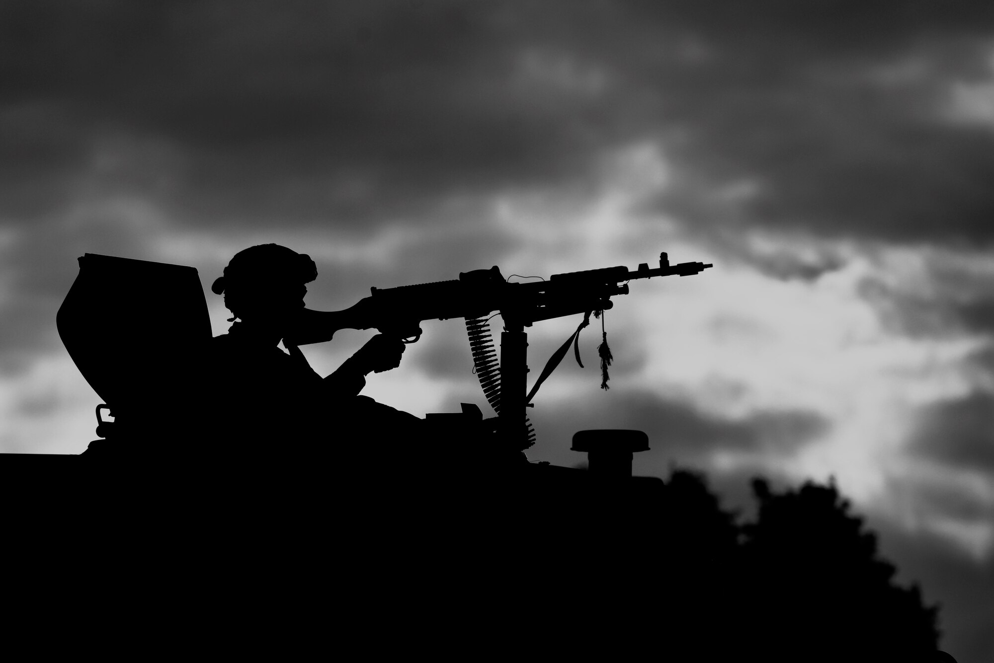 A security forces member simulates a mounted patrol during a Creek Defender field training exercise Sept. 26, 2015, on Baumholder, Germany.  The 21-day course prepares security forces members for their upcoming deployments and is an annual training requirement. (U.S. Air Force photo/Senior Airman Nicole Sikorski)