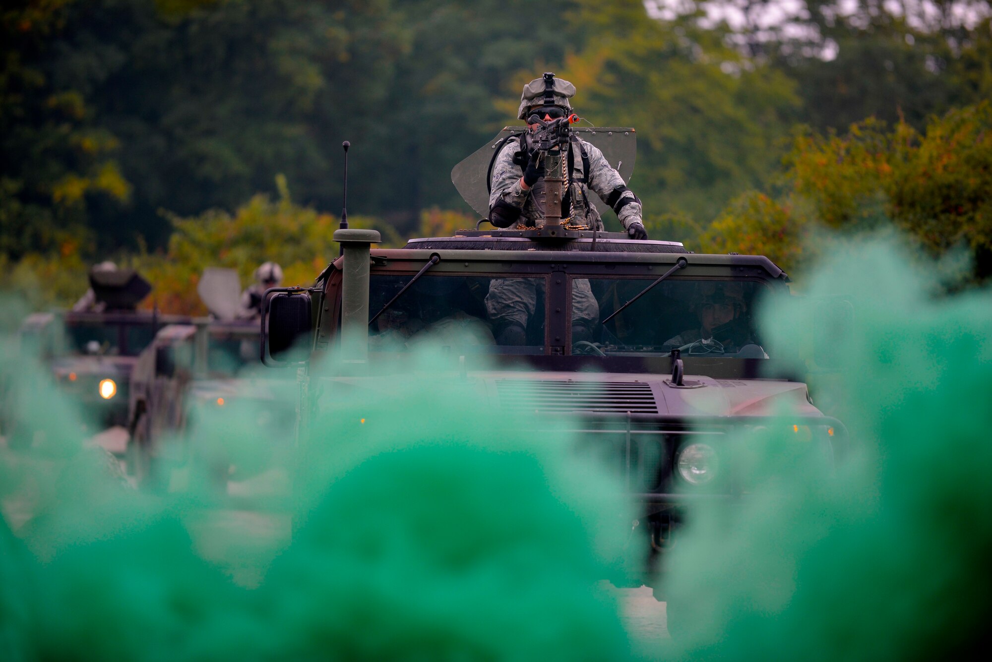 U.S. Air Forces in Europe and Air Forces Africa security forces members perform a mounted patrol during the Creek Defender field training exercise Sept. 26, 2015, on Baumholder, Germany.  The course is an annual training requirement for all security forces members to keep them current on skills needed downrange. (U.S. Air Force photo/Senior Airman Nicole Sikorski)