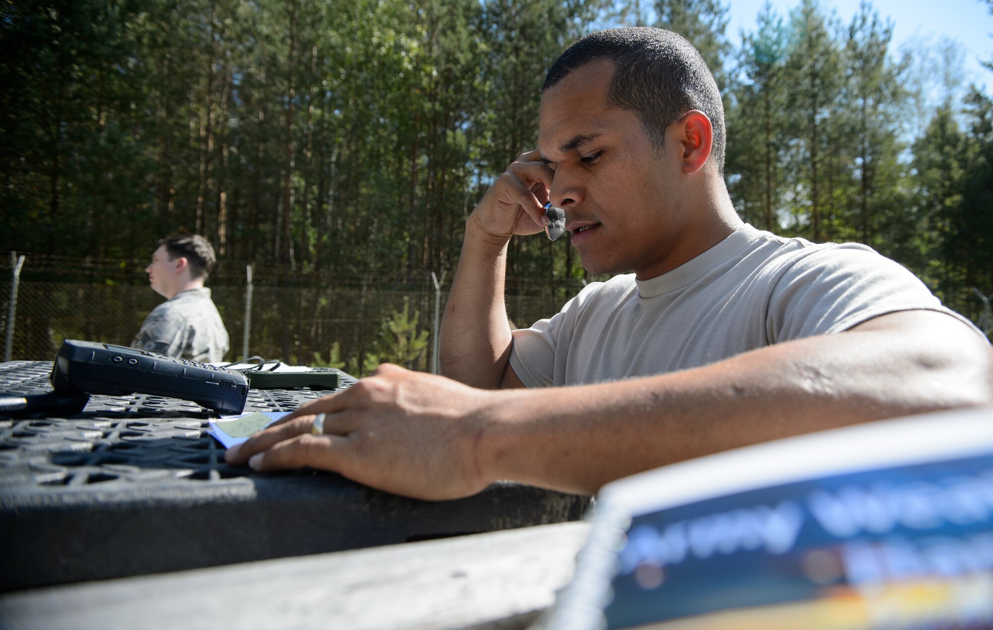 Staff Sgt. Horace Salik, 7th Weather Squadron battlefield weather forecaster, relays weather data to build an accurate forecast during a training exercise Sept. 17, 2015, at Grafenwohr Training Area, Germany. The instructors of the 7th WS used a variety of tools including briefing and hands-on lessons to develop 30 battlefield weather airmen during the annual Cadre Focus training exercise. The 7th WS revamped Cadre Focus to concentrate on basic field training skills and forecasting in Eastern Europe. The squadron is the only one embedded alongside Army units providing weather intelligence throughout the European and African areas of operation. (U.S. Air Force photo/Staff Sgt. Armando A. Schwier-Morales)