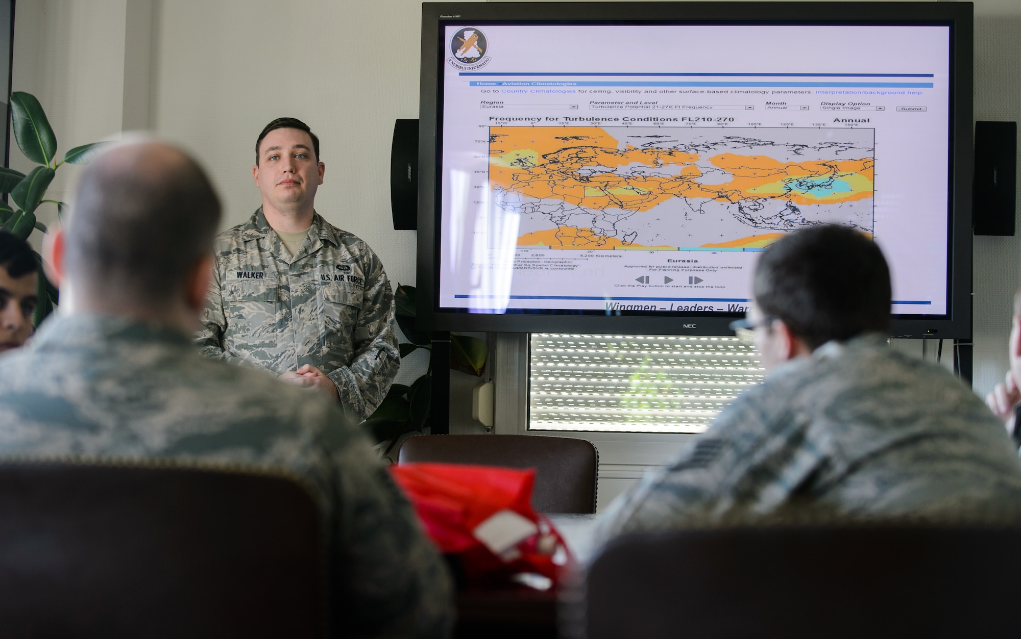 Senior Airman Zan Walker, 7th Weather Squadron battlefield weather forecaster, listens to fellow Airmen critique his briefing Sept. 17, 2015, at Grafenwohr Training Area, Germany. The instructors of the 7th WS used a variety of tools including briefing and hands-on lessons to develop 30 battlefield weather airmen during the annual Cadre Focus training exercise. The 7th WS revamped Cadre Focus to concentrate on basic field training skills and forecasting in Eastern Europe. The squadron is the only one embedded alongside Army units providing weather intelligence throughout the European and African areas of operation. (U.S. Air Force photo/Staff Sgt. Armando A. Schwier-Morales)